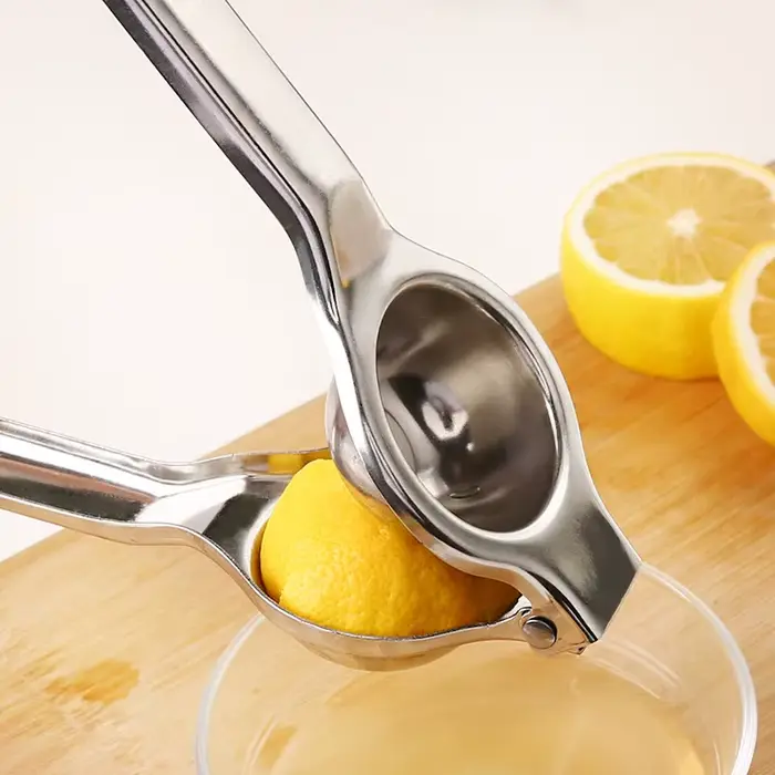 Presse-citron manuel en acier inoxydable