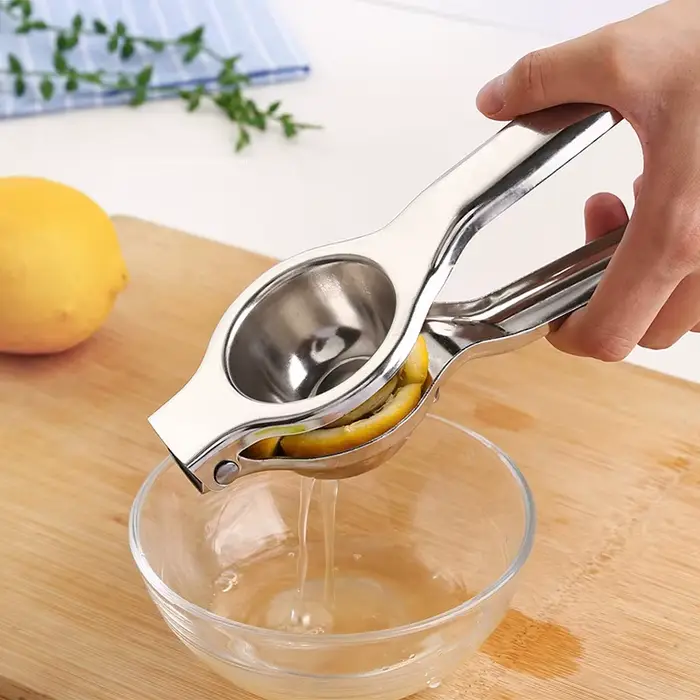 Presse-citron manuel en acier inoxydable
