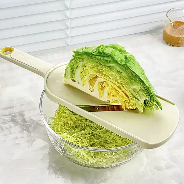 Coupe-légumes et râpe à chou