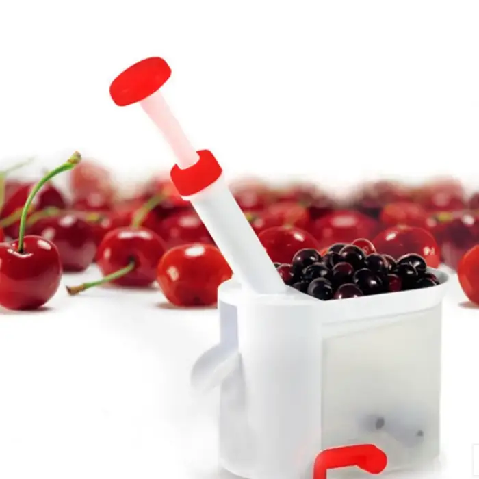 Machine d'extraction de graines de cerises