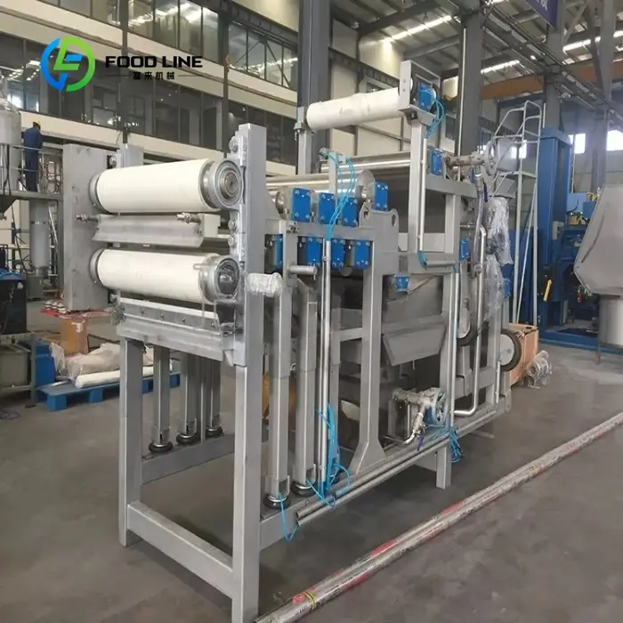 Presse-agrumes industriel grande capacité avec filtre pour usine de transformation alimentaire et de boissons