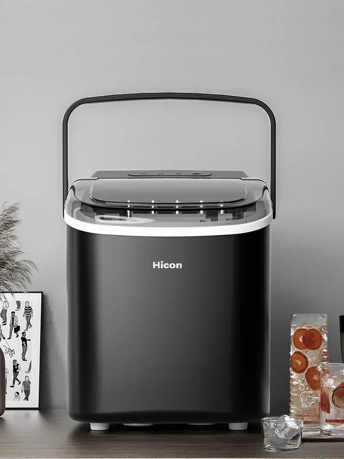 Machine à glaçons électrique avec poignée